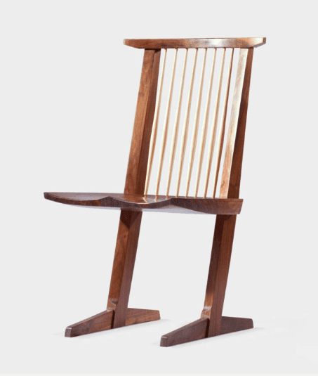 A wooden chair with a distinctive silhouette, featuring a sculpted seat, a high, angled backrest com… — 3D model