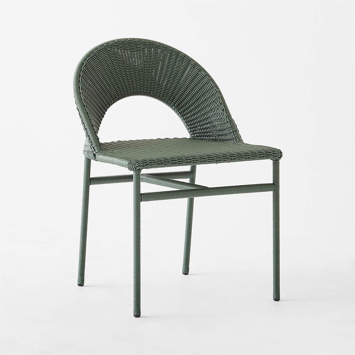 An armless dining chair featuring a full-body weave of dark green synthetic rattan over a metal fram… — 3D model