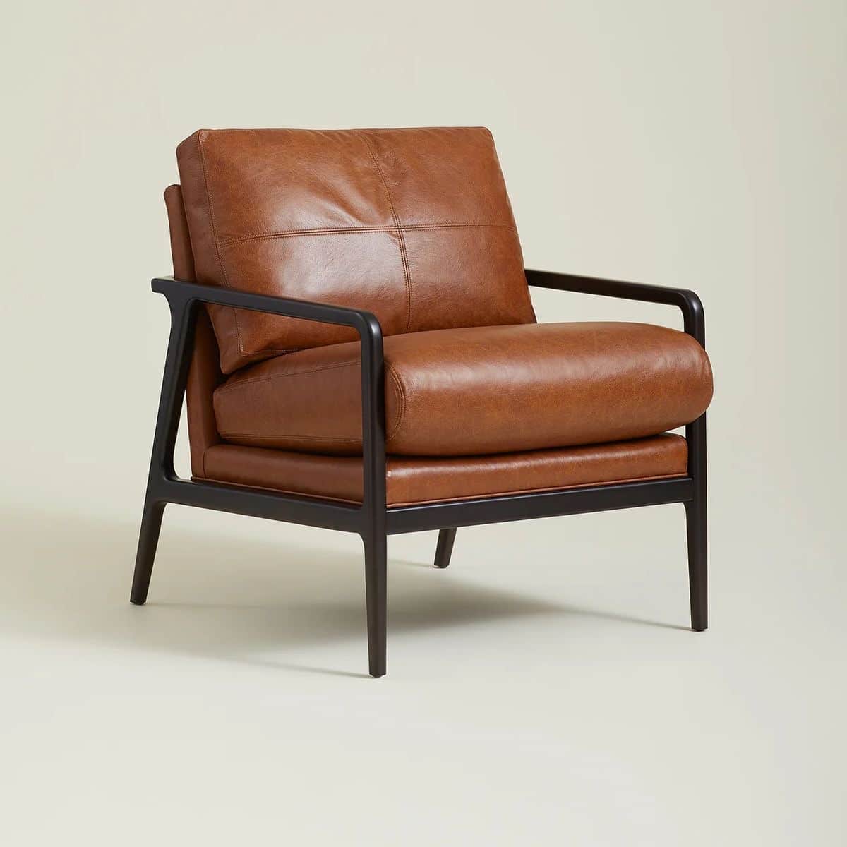 A contemporary armchair featuring a dark, possibly wood or metal, frame with sleek, straight lines.… — free OBJ 3D model
