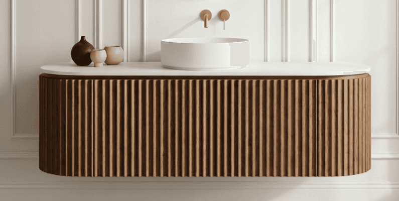 A contemporary wall-mounted bathroom vanity featuring a fluted wood cabinet, a white solid surface c… — 3D model
