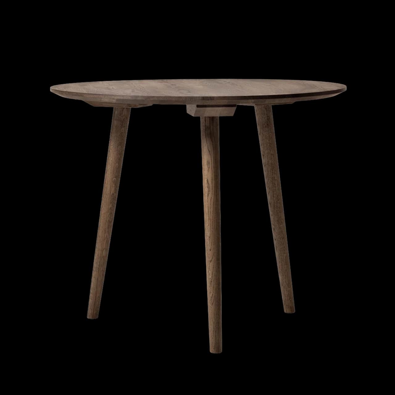 A minimalist round accent table crafted from solid wood, featuring a circular top and three splayed,… — free STL 3D model