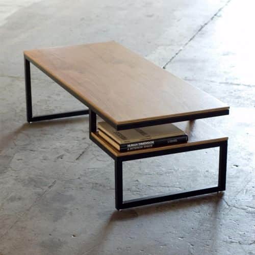 A rectangular, two-tier coffee table featuring light-colored wooden surfaces and a black metal frame… — 3D model