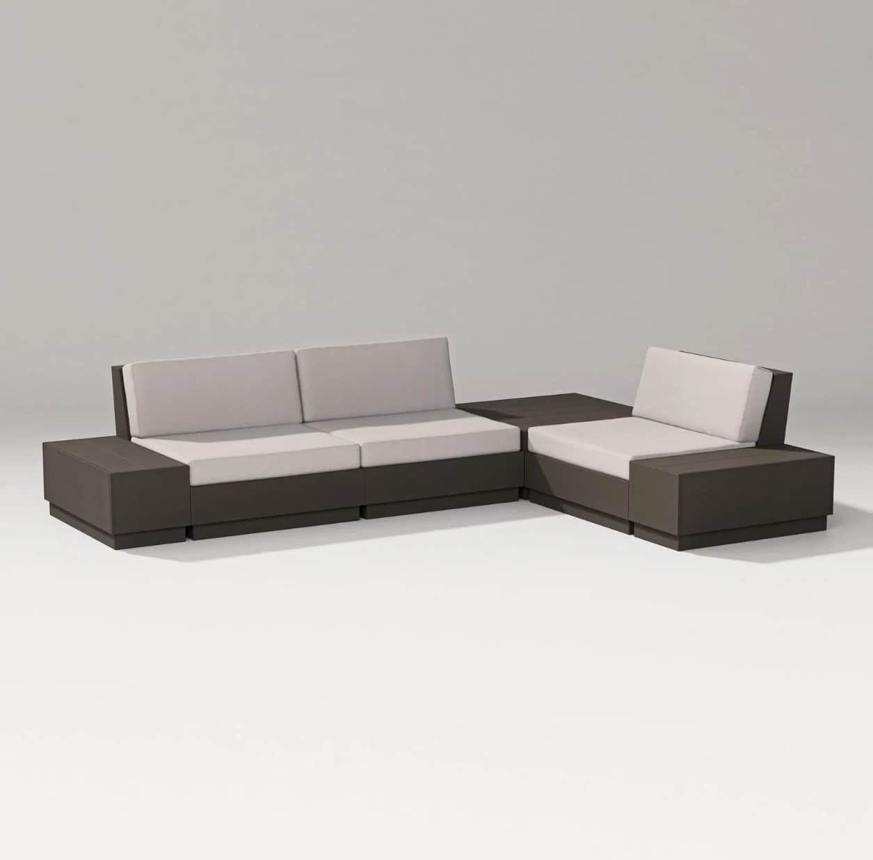 A modern sectional sofa composed of multiple modular units. The base and armrests are constructed fr… — 3D model