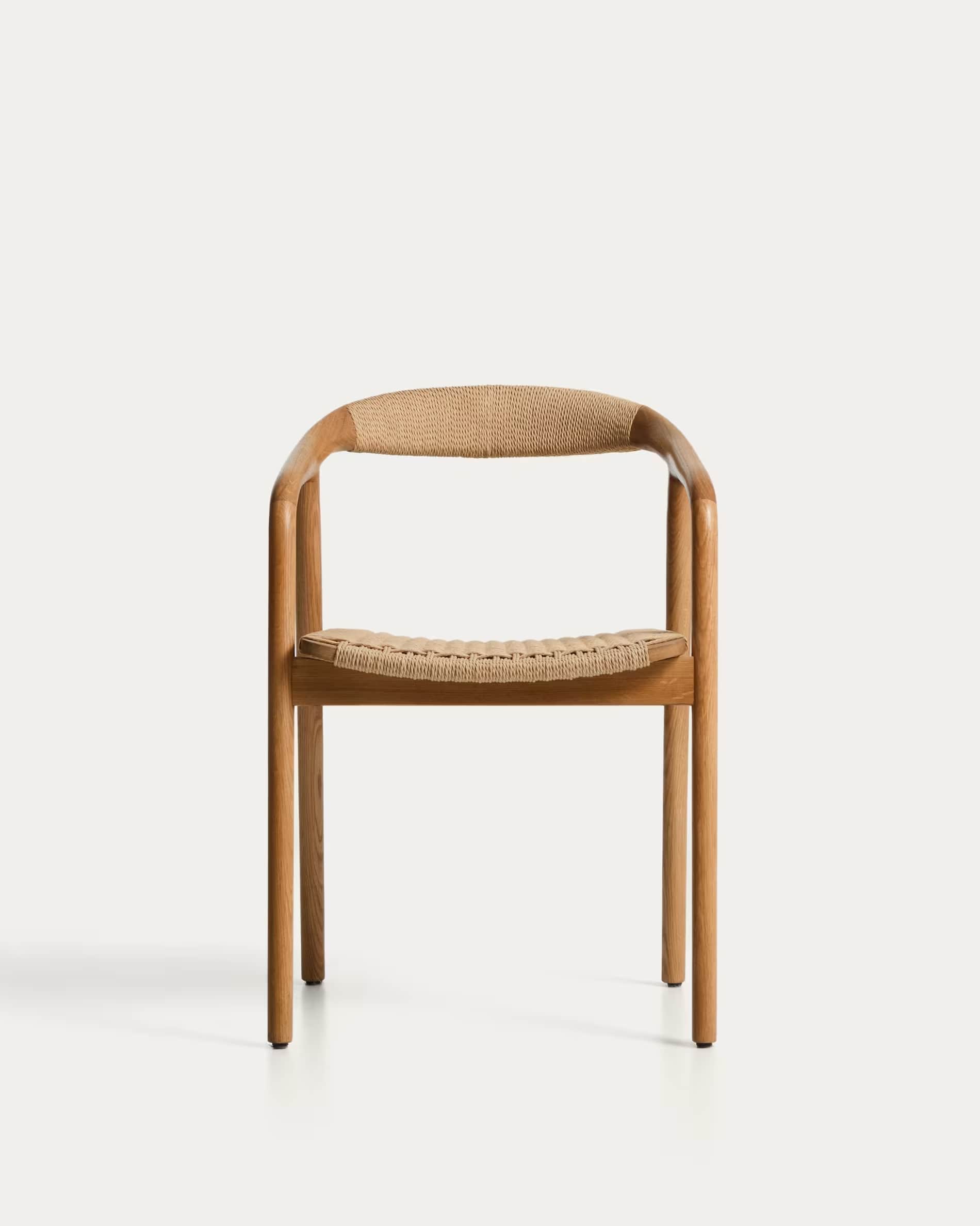 A modern dining chair with a curved backrest and a woven seat. The frame is constructed from light-c… — 3D model