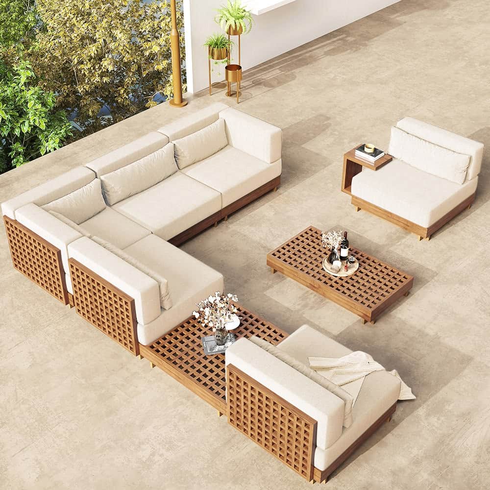 A modular outdoor sofa set featuring a sectional sofa, an armless chair, and a coffee table. The fur… — 3D model