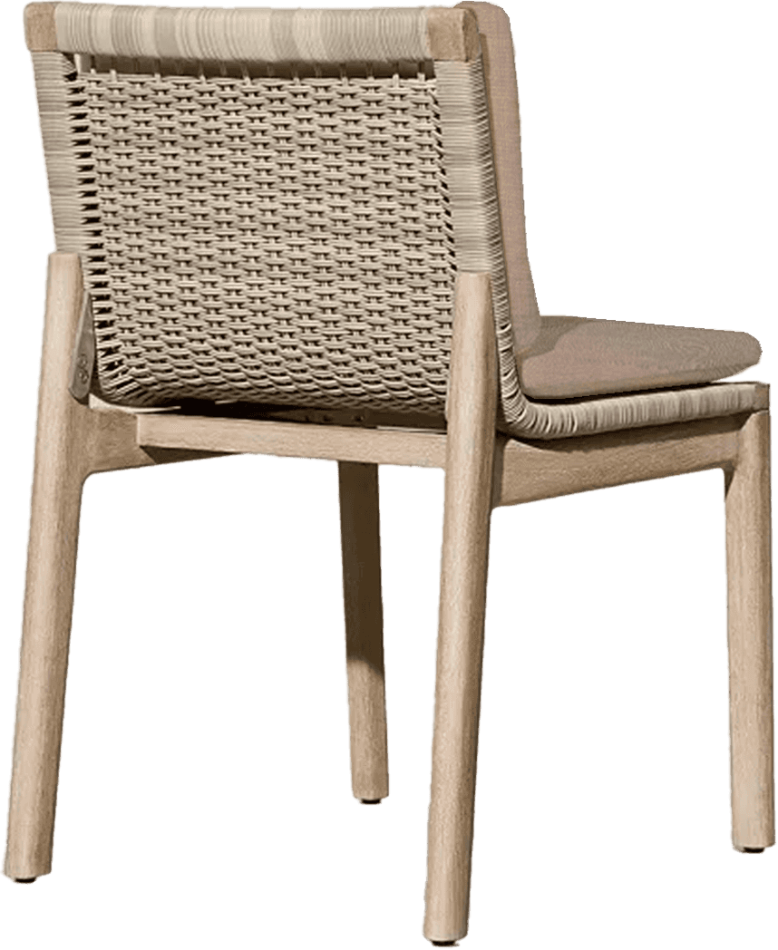 A modern armless chair featuring a light-colored wooden frame, a woven backrest, and a soft seat cus… — 3D model