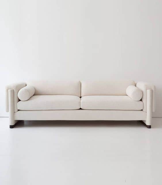 A modern, two-seater sofa with a clean, minimalist design. It features a rectangular frame, upholste… — 3D model