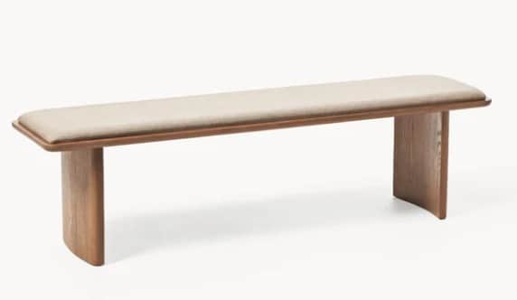A contemporary bench with a cushioned top and solid wood legs. The bench has a minimalist design wit… — 3D model