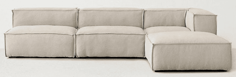 A modular sectional sofa with clean lines and a low profile. It features plush, oversized cushions a… — 3D model