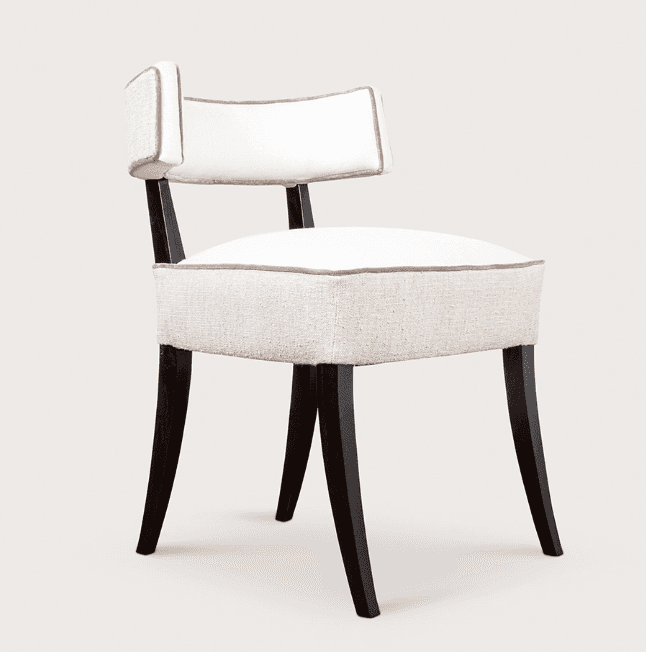 An upholstered armless side chair featuring a padded seat and a low, curved backrest. The upholstery… — 3D model
