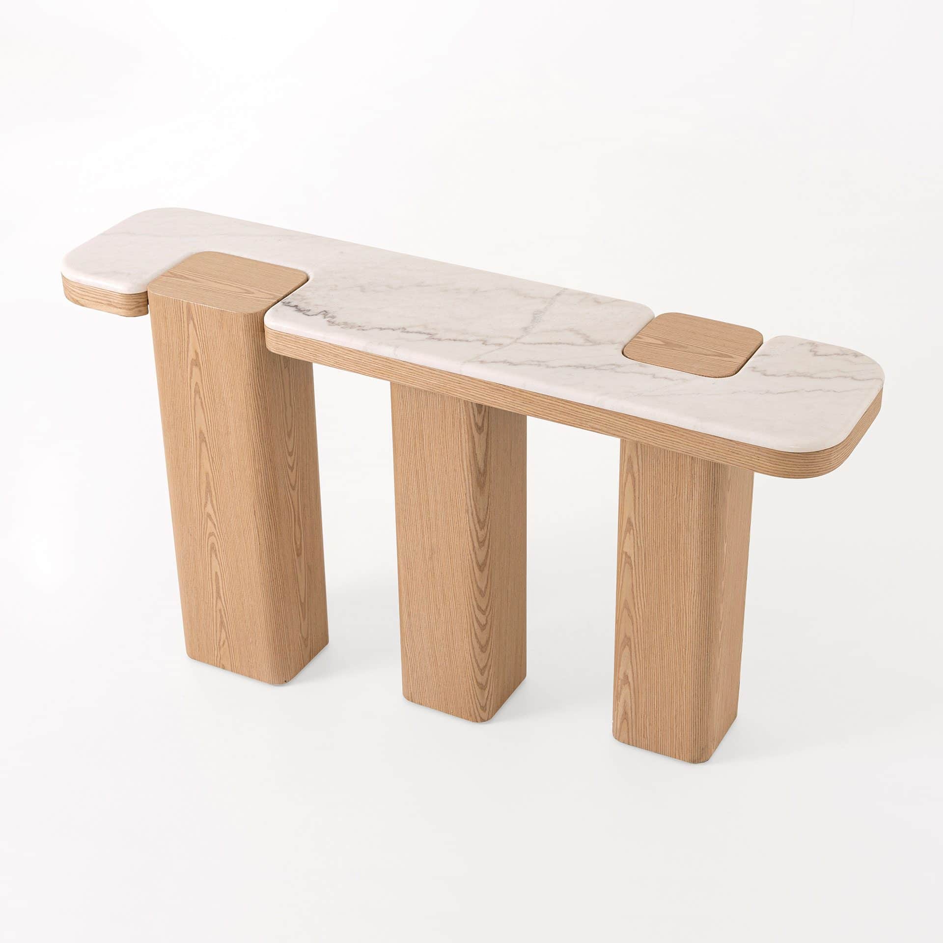 A modern console table with a distinctive design. It features a rectangular top made of white marble… — 3D model