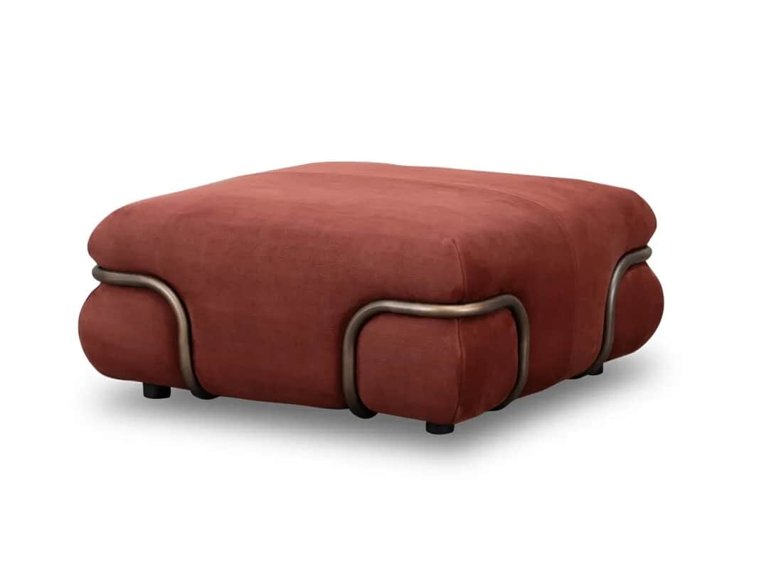 A square, heavily upholstered ottoman featuring a soft, reddish-brown fabric and a unique external f… — 3D model