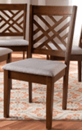 A wooden dining chair featuring a rich brown finish, an intricately designed lattice backrest, and a… — free BLEND 3D model