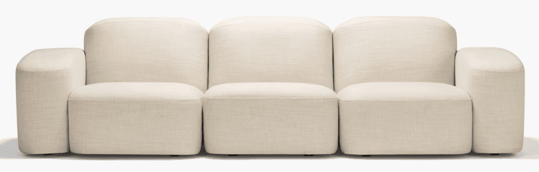 A three-seater sofa with a modular design, featuring rounded arms and backrests. The upholstery has… — 3D model