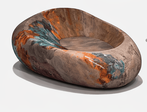 A uniquely shaped armchair with an organic, rounded form resembling a smooth stone or pod. The exter… — 3D model
