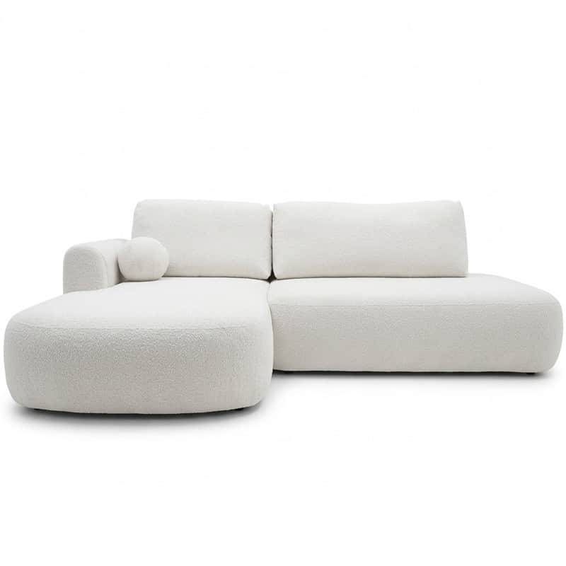 An L-shaped sectional sofa upholstered in white or off-white boucle fabric, featuring soft, rounded… — 3D model