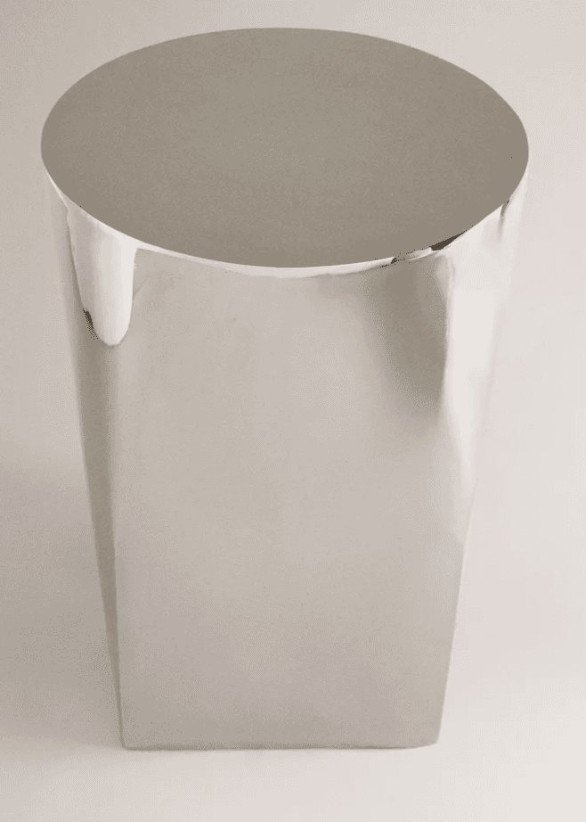 A sleek, cylindrical pedestal table featuring a polished metallic finish. The object has a uniform d… — free STL 3D model