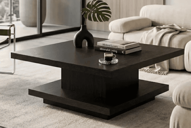 A minimalist square coffee table featuring a two-tiered design in a dark wood finish. The table cons… — 3D model