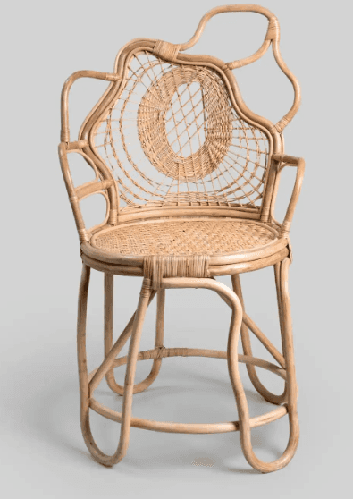A unique armchair constructed from rattan. It features a woven seat and backrest with a distinctive… — free FBX 3D model