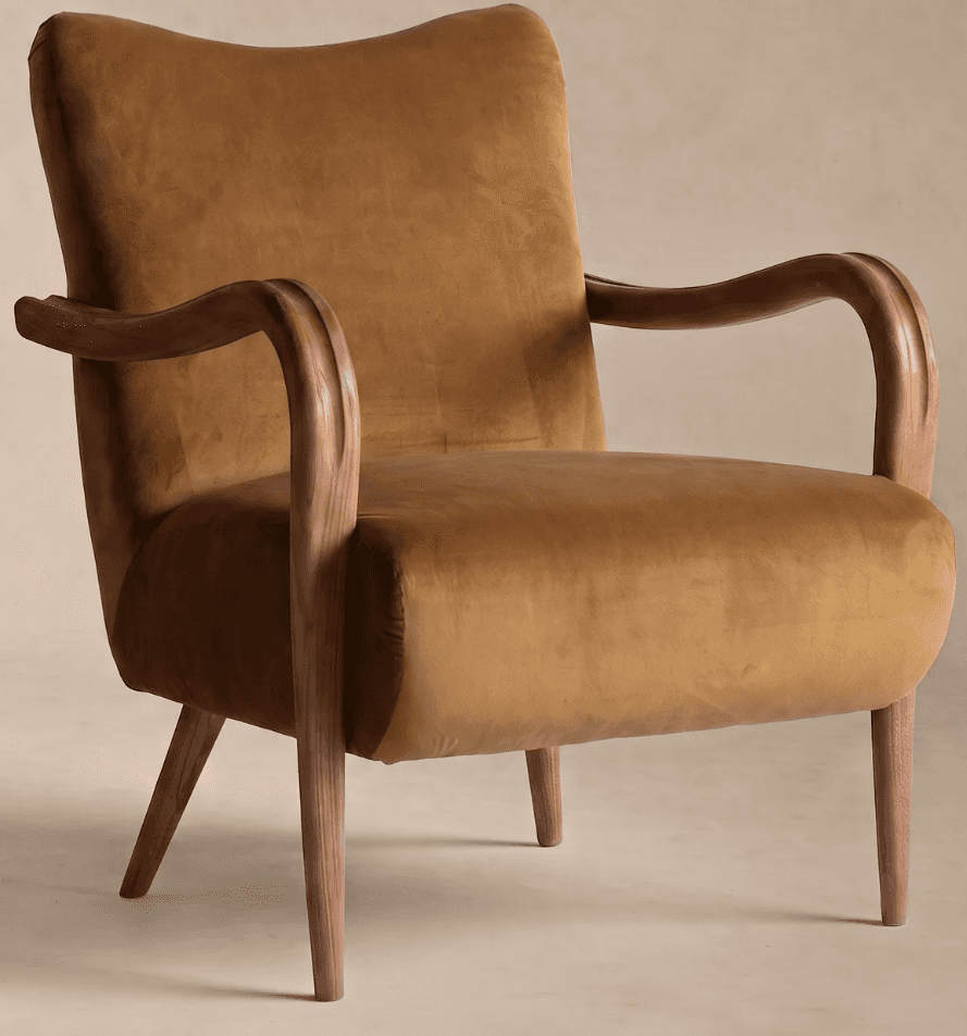 A single-seater lounge chair featuring golden-brown velvet upholstery and an exposed wooden frame, i… — free BLEND 3D model