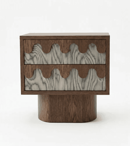 A contemporary nightstand featuring two drawers with a distinctive wave-like carved wooden facade. T… — 3D model