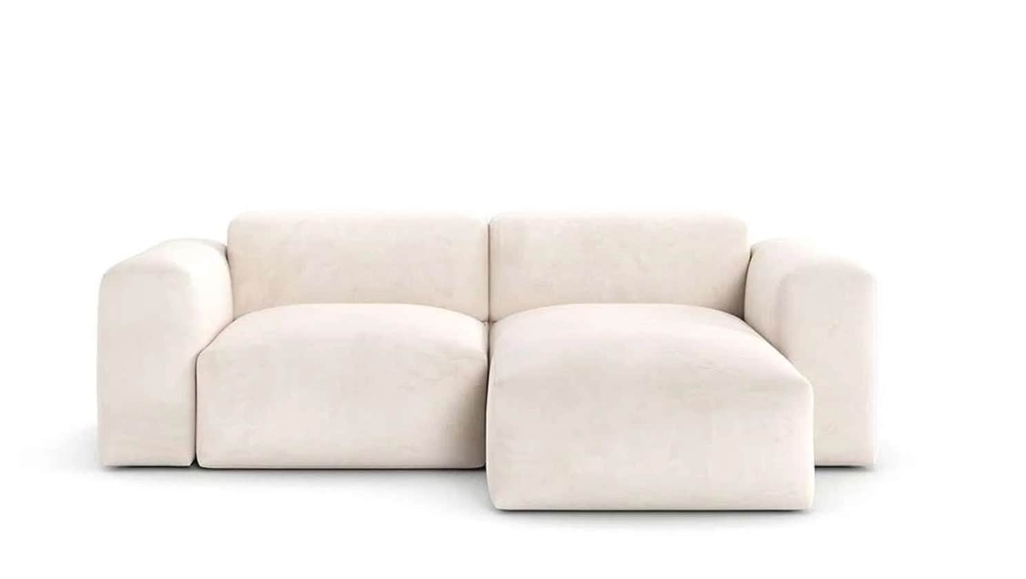A minimalist modern modular sectional sofa featuring a chaise lounge, upholstered in a light-colored… — 3D model