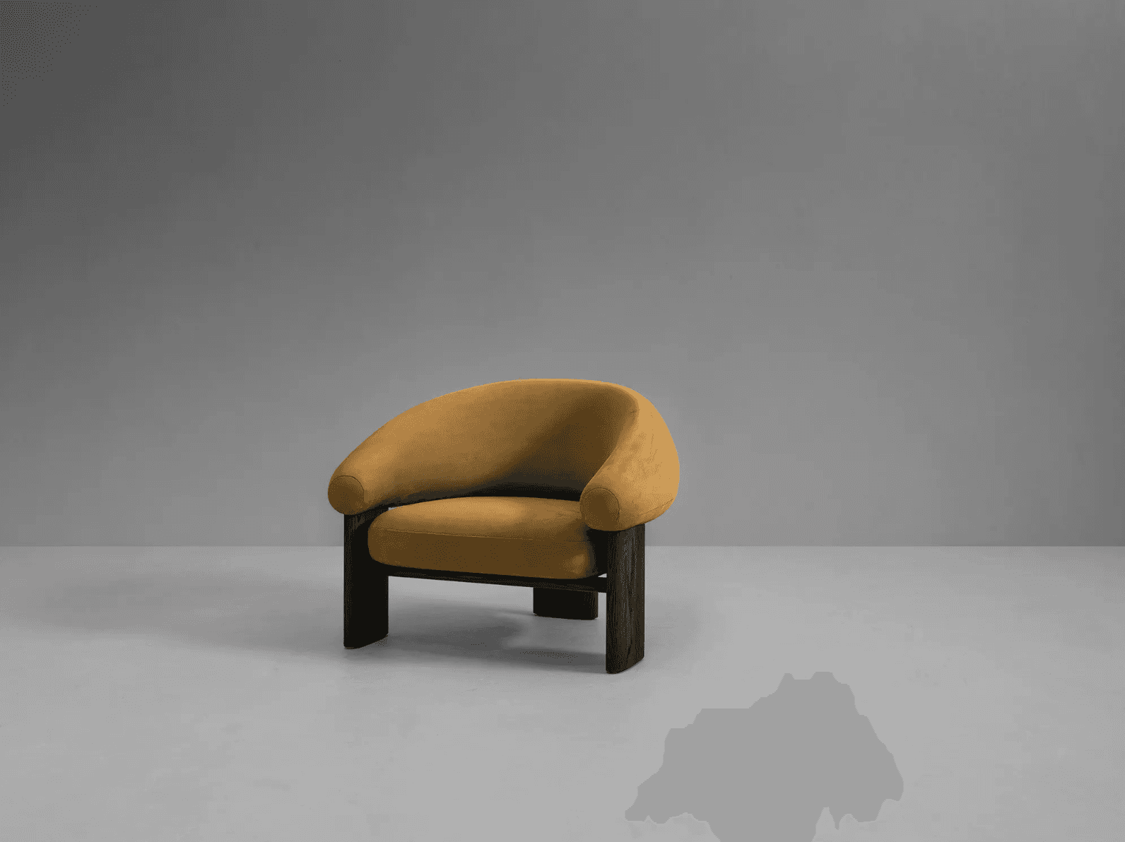 A contemporary armchair featuring a rounded, enveloping backrest and seat upholstered in a textured… — free OBJ 3D model