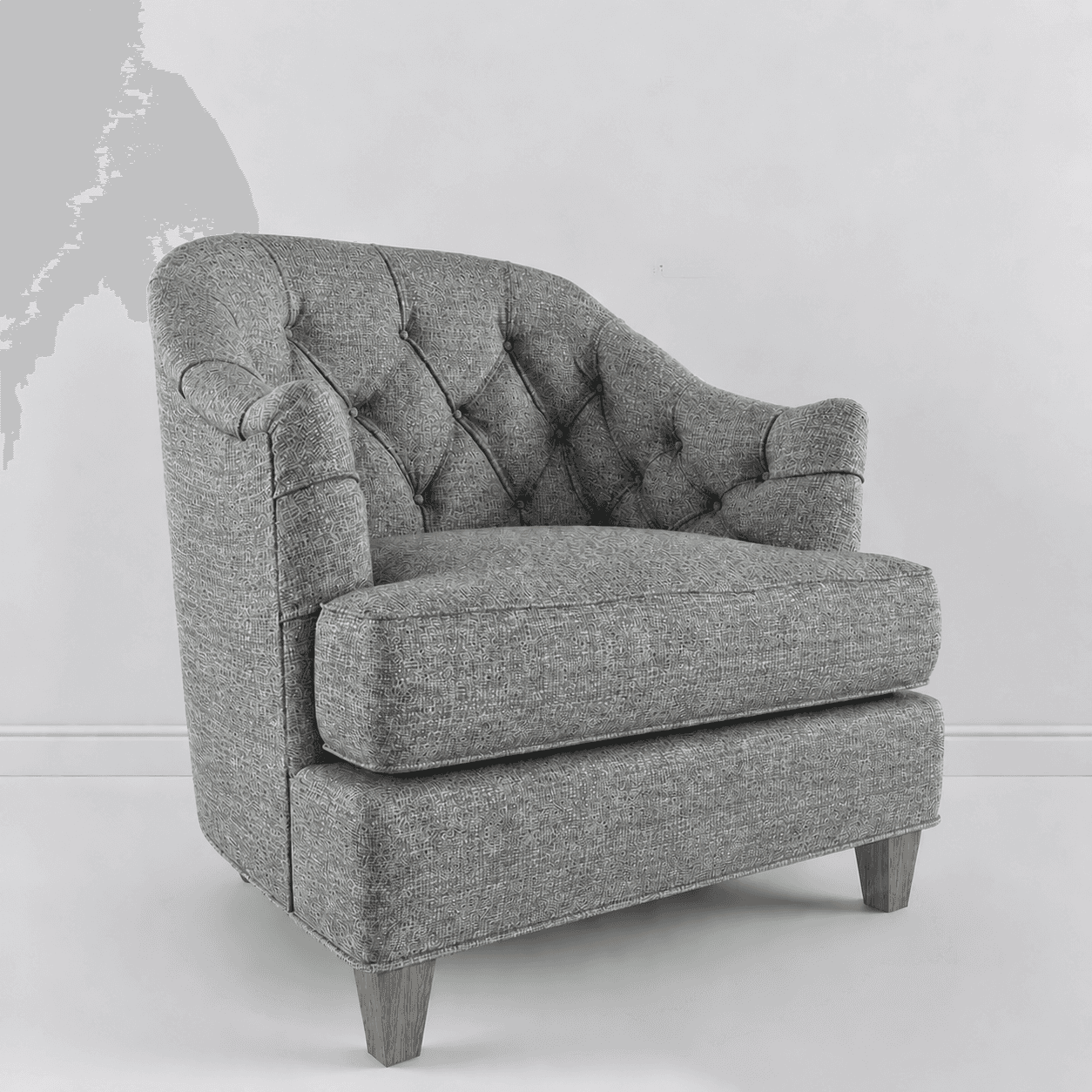 A button-tufted upholstered armchair featuring a textured grey fabric. The chair has a high, rounded… — 3D model