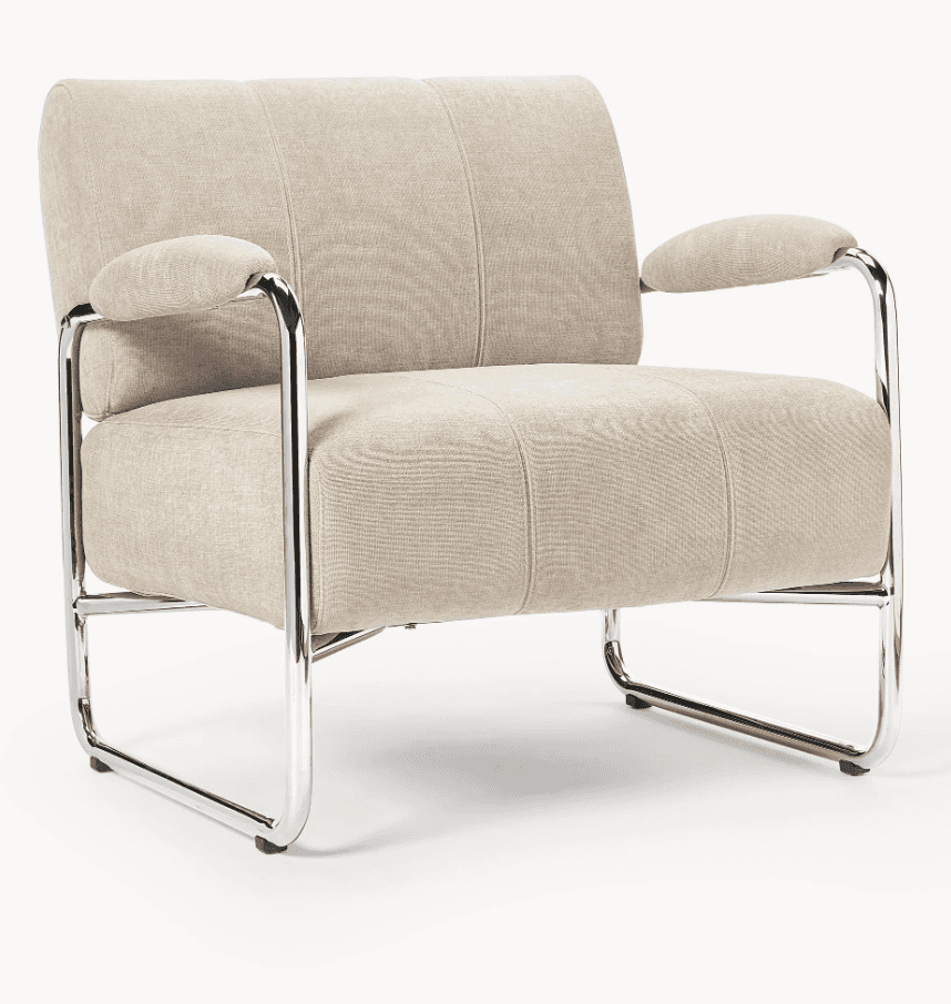 A modern lounge chair featuring a sturdy tubular chrome frame and plush beige fabric upholstery. The… — 3D model