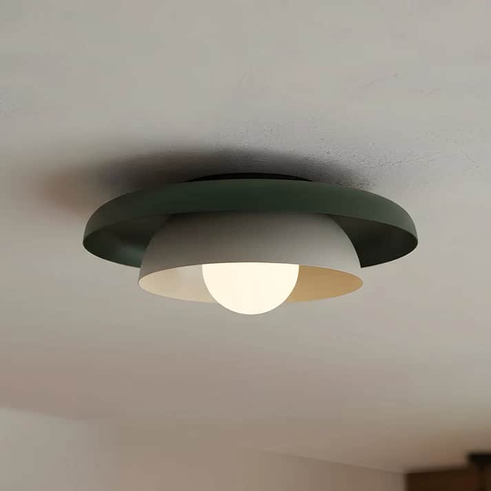 A modern ceiling light fixture featuring a layered design. The outermost shade is a wide, shallow da… — 3D model