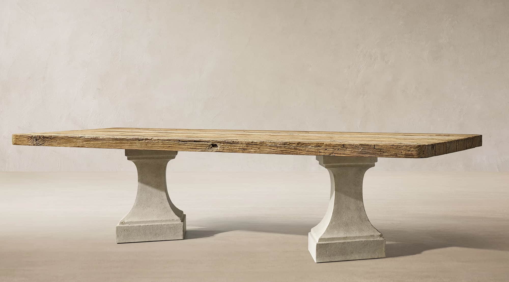 A rectangular dining table featuring a thick, distressed reclaimed wood plank top supported by two s… — free GLTF 3D model