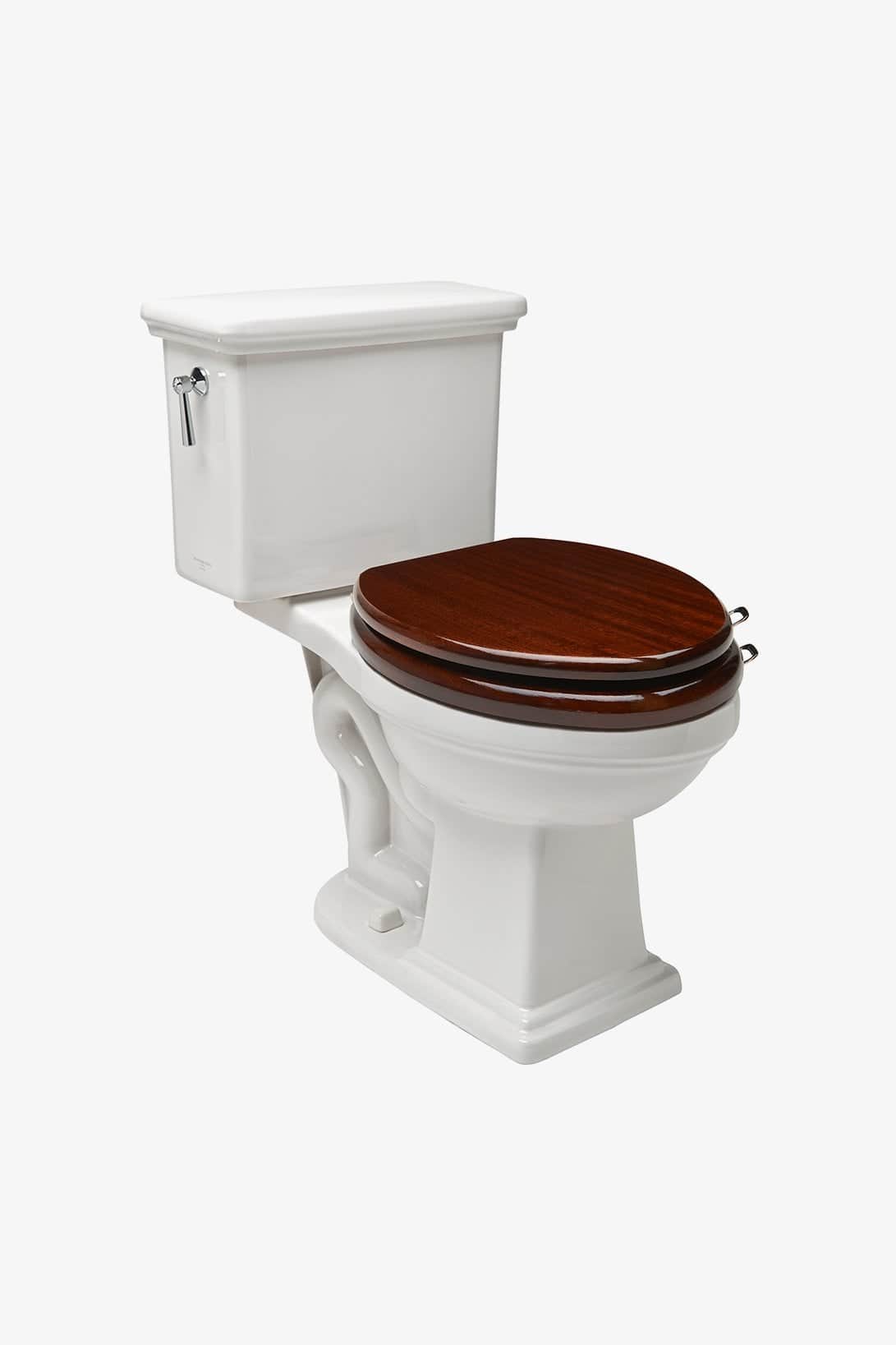 A white ceramic toilet with a dual-purpose tank and a dark wood toilet seat. The tank has a polished… — free BLEND 3D model