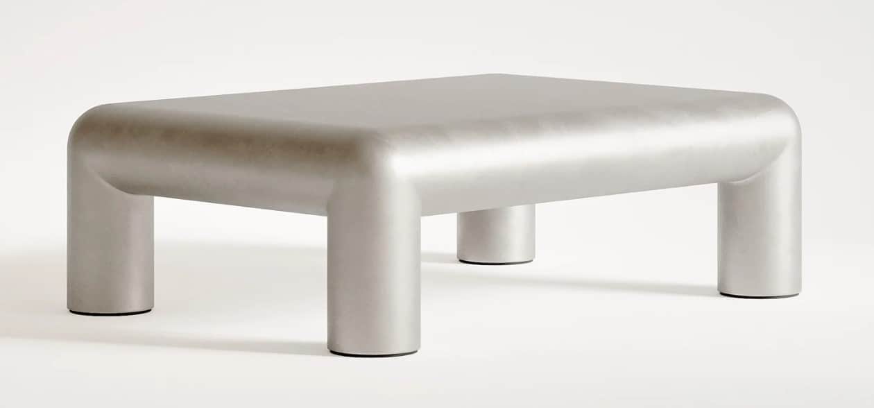 A contemporary coffee table with a monolithic design. It features a rectangular top with rounded edg… — 3D model