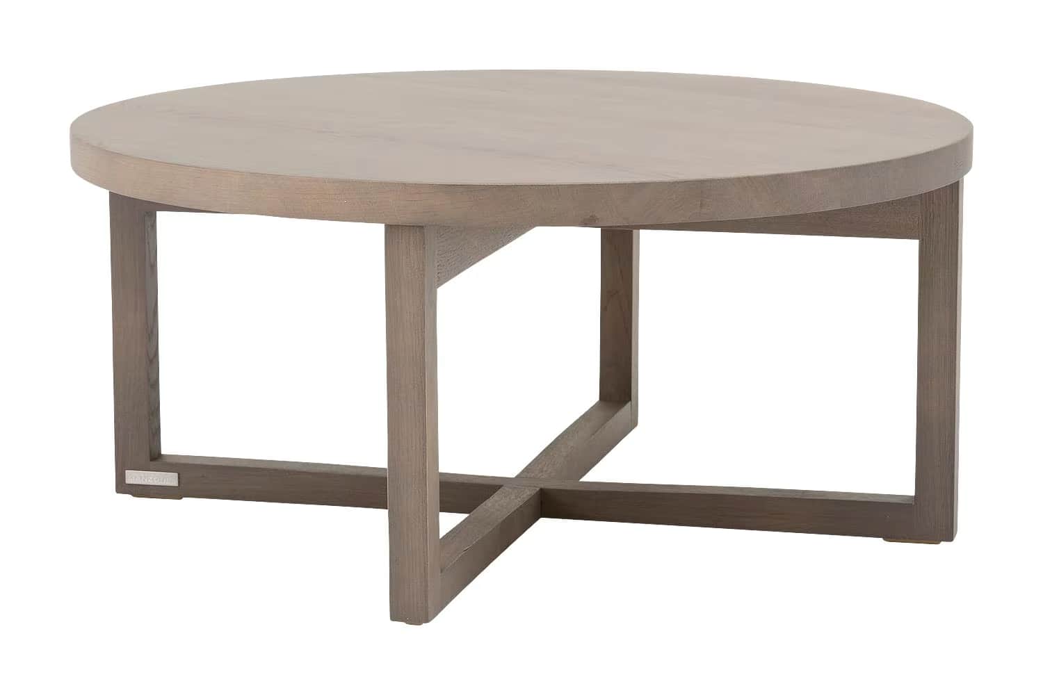 A modern round coffee table featuring a solid circular tabletop and a distinctive cross-base design.… — 3D model