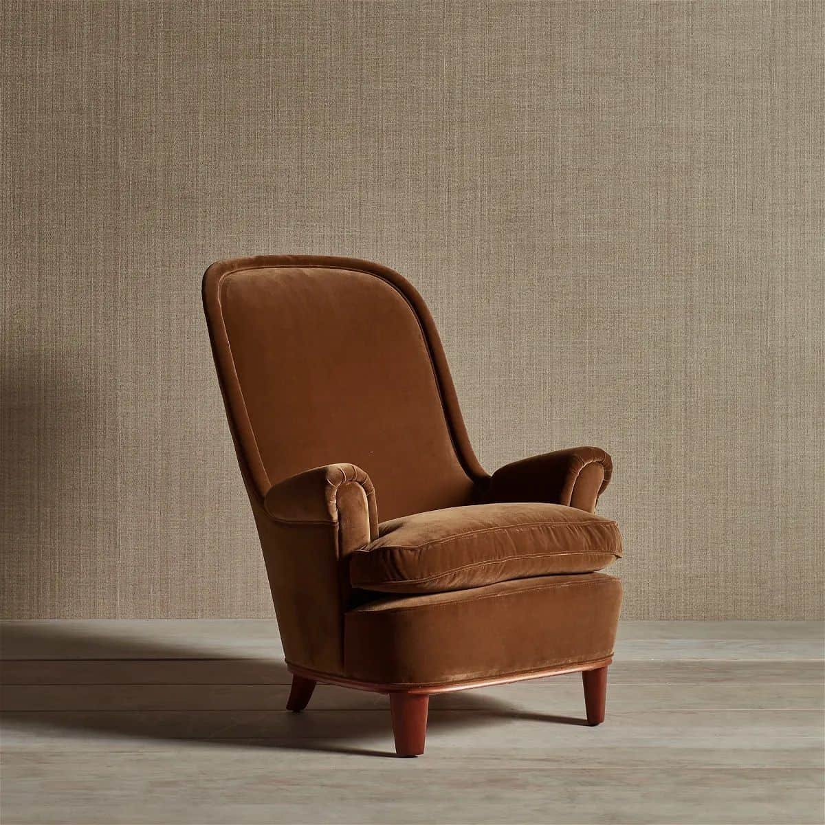 A plush, brown velvet upholstered lounge armchair featuring a high, gently curved backrest, rolled a… — free GLTF 3D model