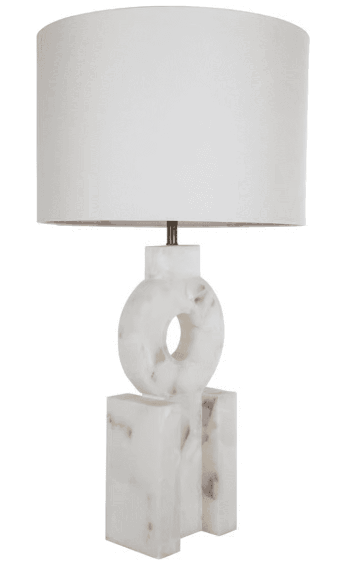 A modern table lamp featuring a sculptural, geometric base crafted from white onyx with subtle brown… — 3D model