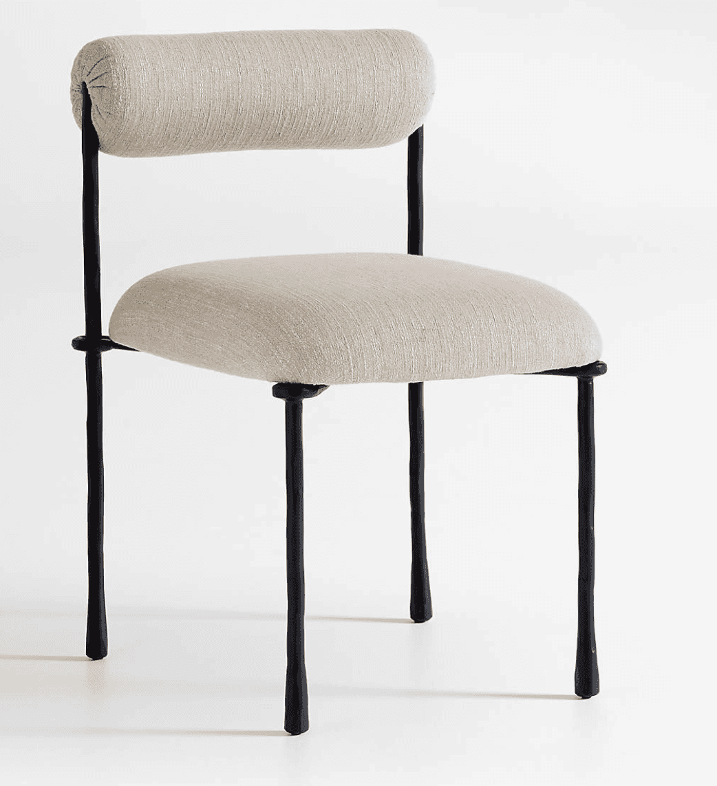A modern armless chair featuring a dark-colored metal frame with an organic, somewhat irregular text… — 3D model