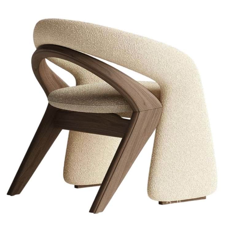 A contemporary armchair featuring a sculptural wooden frame and plush bouclé upholstery. The frame a… — 3D model