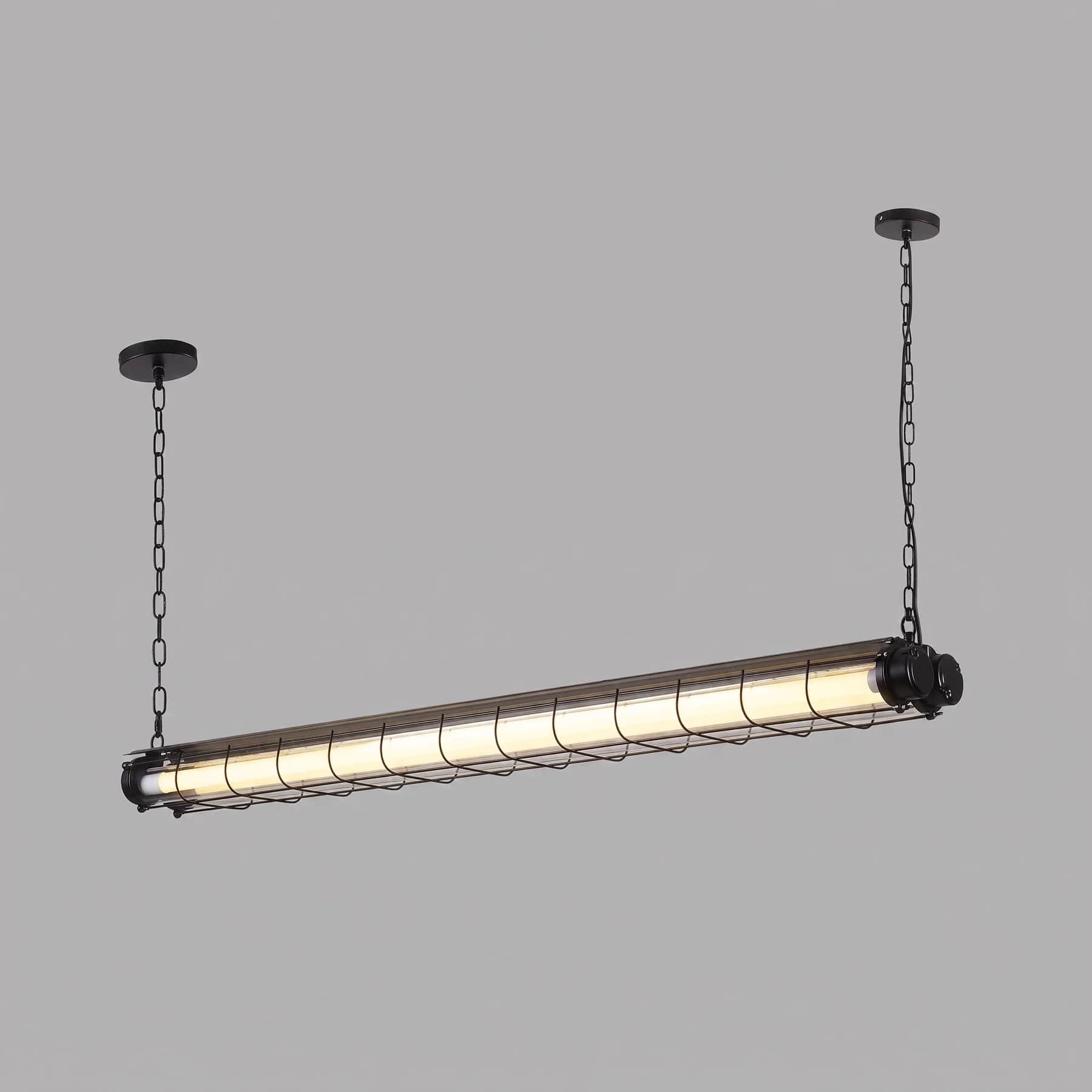 A long, linear black industrial-style pendant light, featuring a protective metal cage around a tubu… — 3D model