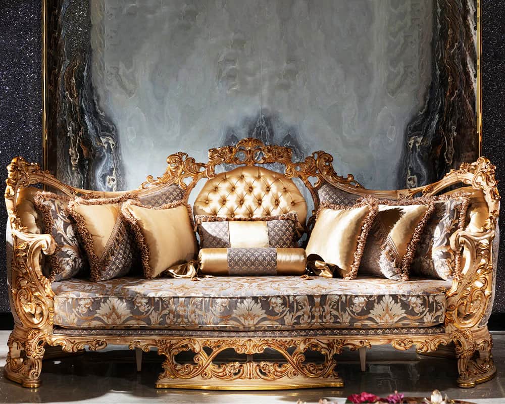 A baroque-style sofa with a carved wooden frame finished in gold. The upholstery features tufted bei… — free GLTF 3D model