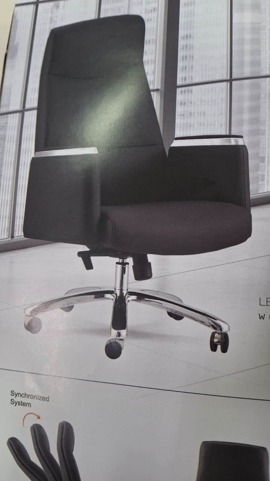 A high-back executive office chair upholstered in black synthetic leather, featuring padded armrests… — 3D model