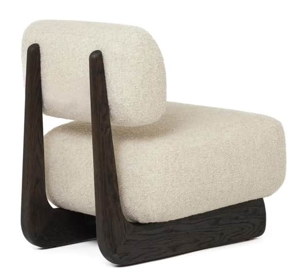 A modern, low-profile lounge chair featuring plush, off-white bouclé upholstery and a distinctive da… — 3D model