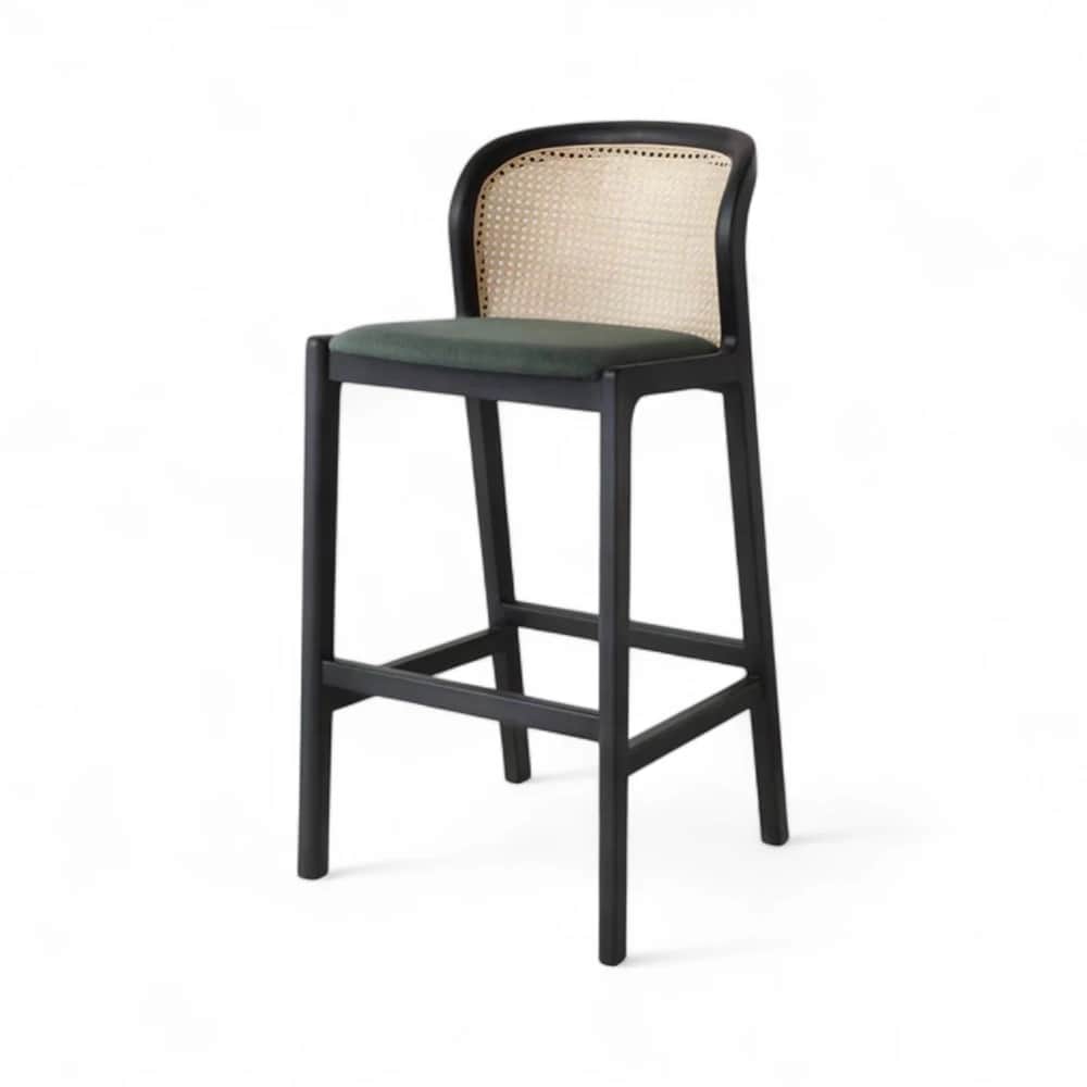 A modern bar stool featuring a solid black wooden frame, a natural cane woven backrest, and a dark g… — 3D model