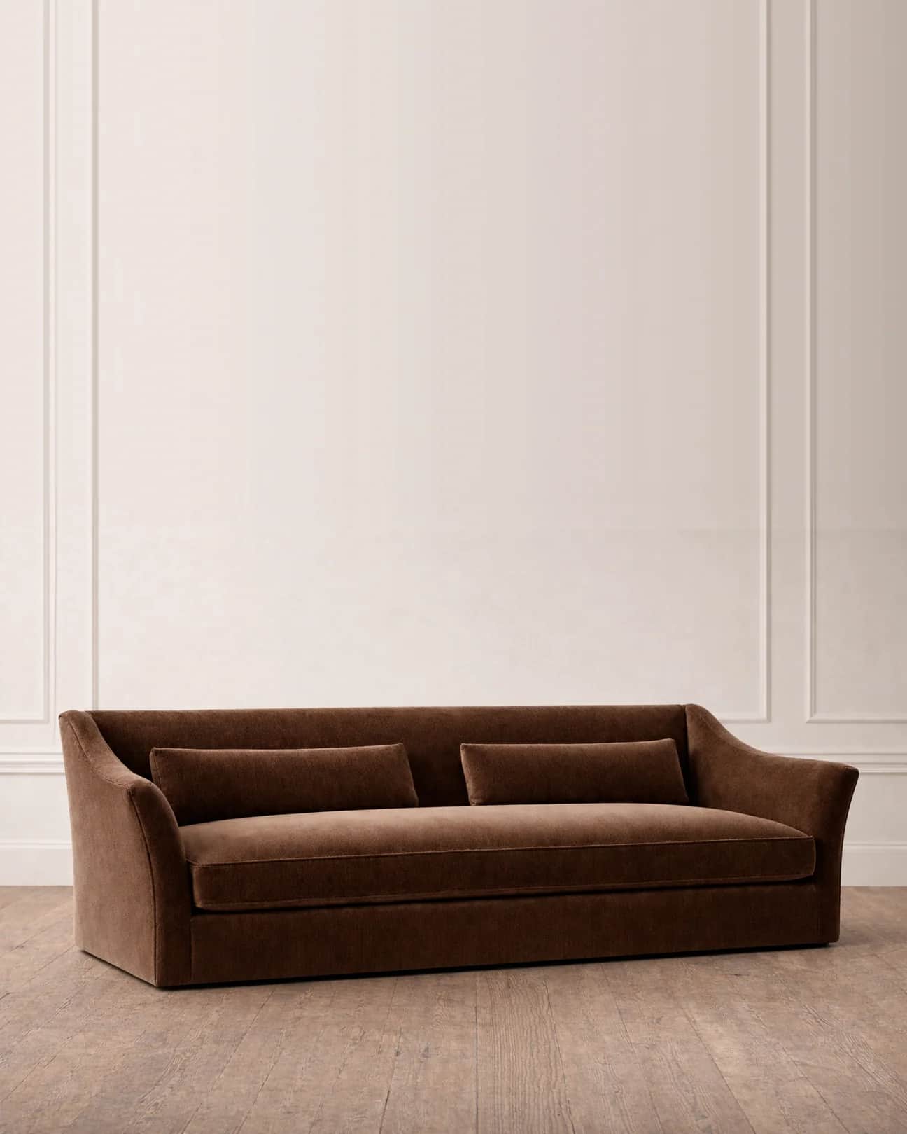 A contemporary two-seater sofa upholstered in a rich brown velvet or plush fabric, featuring gently… — free STL 3D model