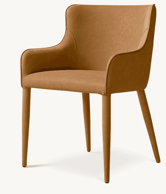 A contemporary armchair upholstered in a smooth, tan leather-like material, featuring integrated arm… — 3D model