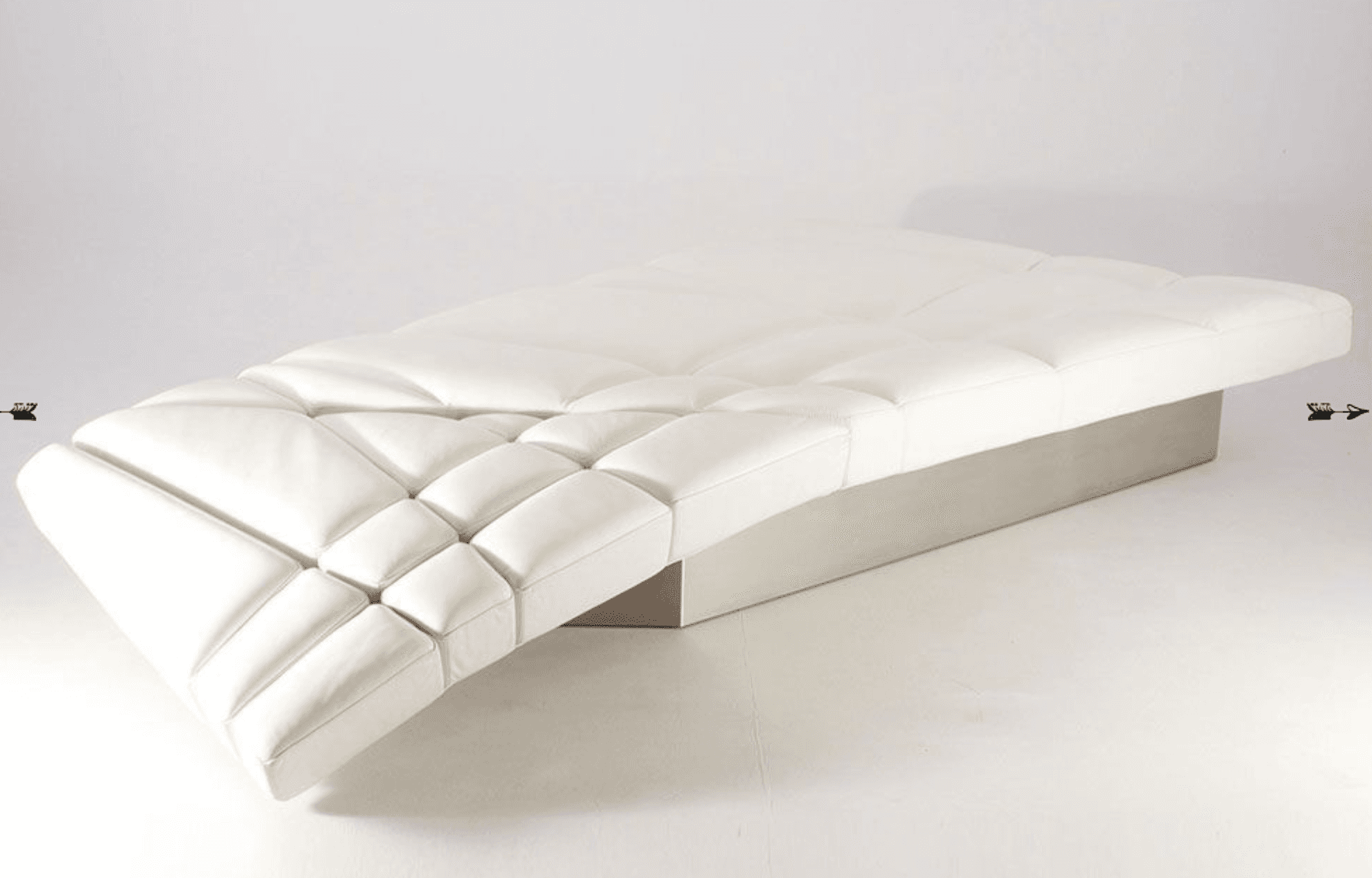 A modern white chaise lounge with a tufted, segmented seating surface. The base appears to be a soli… — 3D model