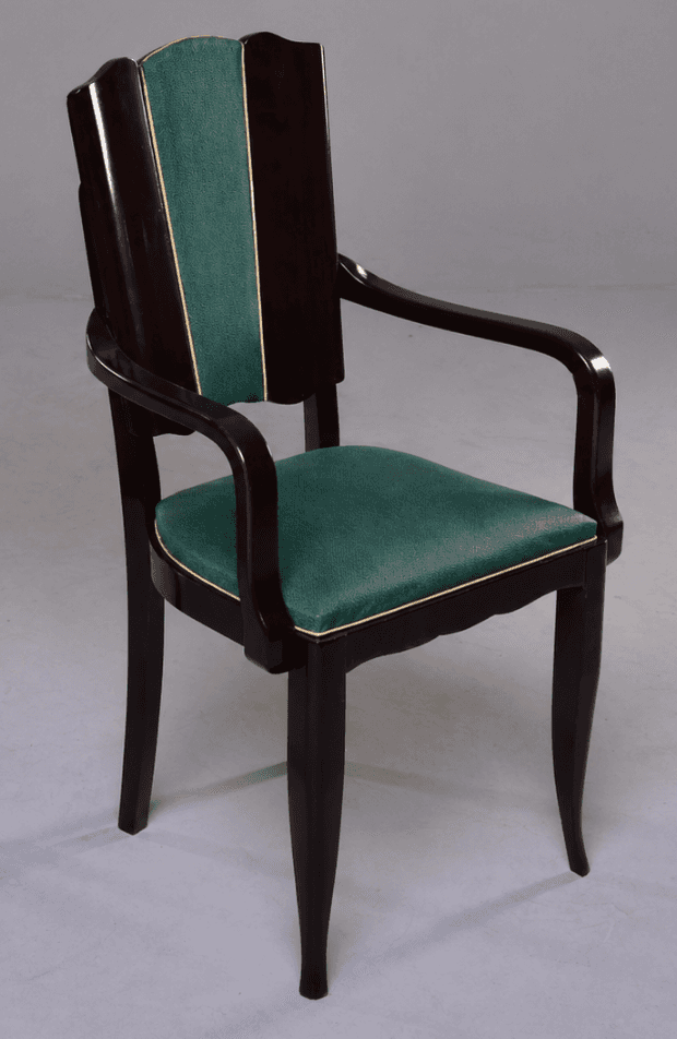A dark wood armchair with upholstered green seat and backrest. The chair features curved armrests an… — 3D model