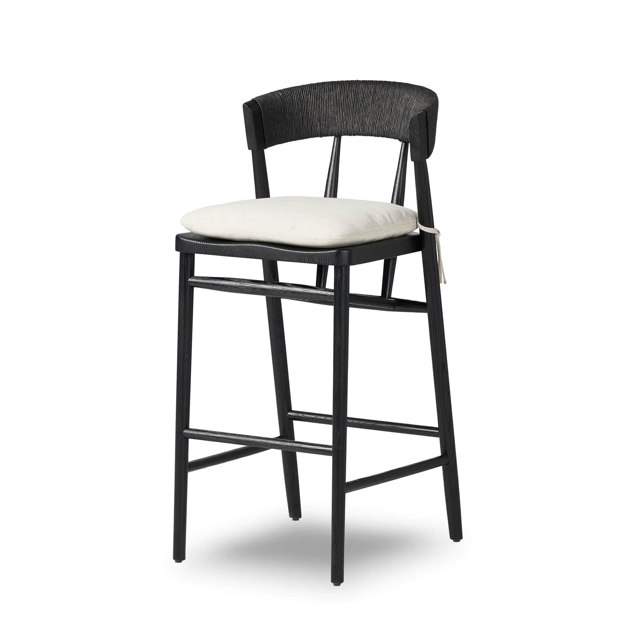 A modern bar stool with a black wooden frame and a woven backrest. It features a lightly upholstered… — free SKP 3D model