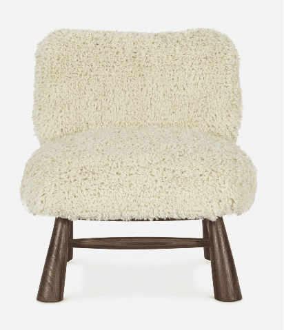 A contemporary low-profile lounge chair featuring plush, cream-colored shaggy upholstery, resembling… — free FBX 3D model