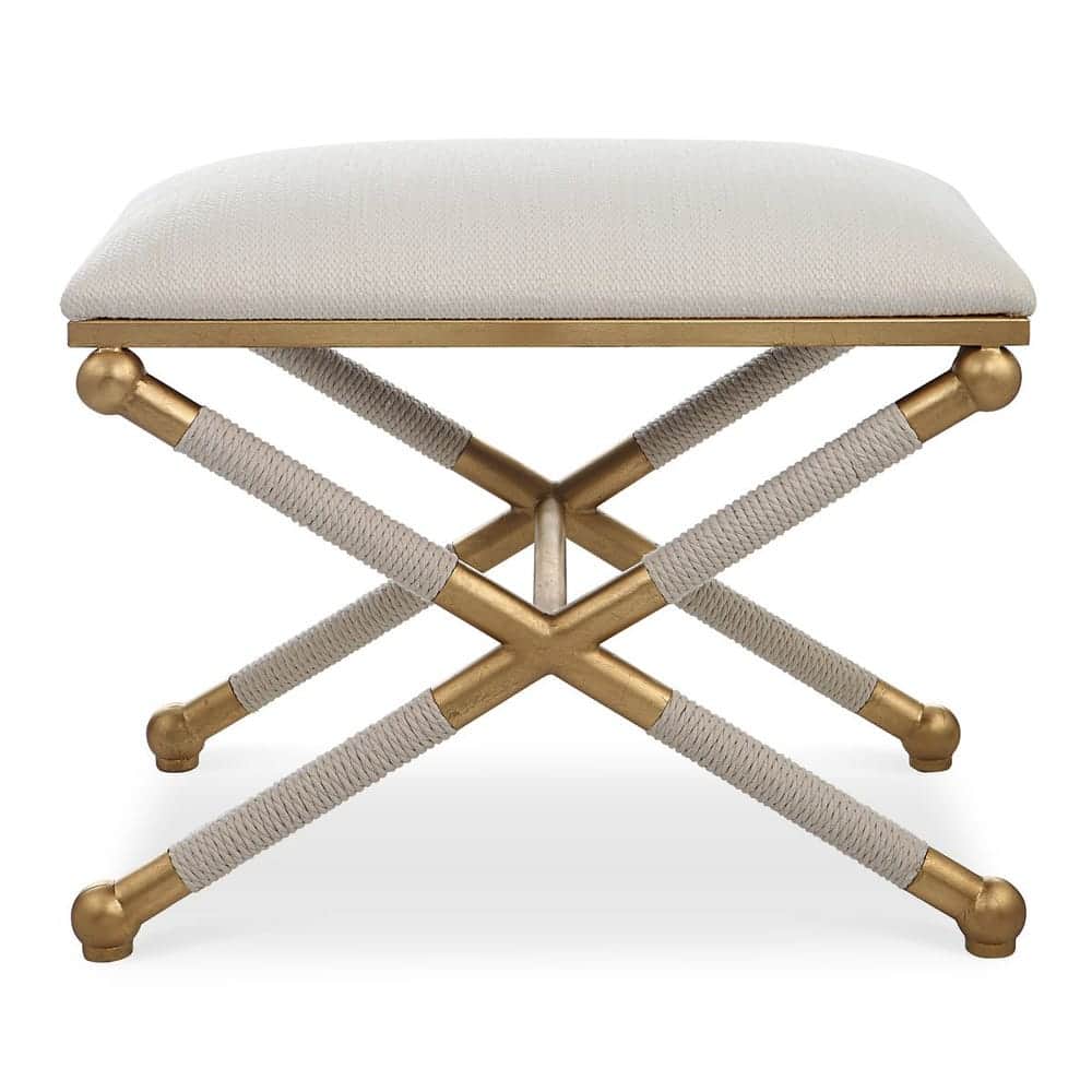 A compact, rectangular upholstered ottoman featuring a distinctive X-shaped metallic base partially… — 3D model